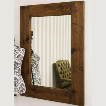 dark wooden wall mirror is a great example