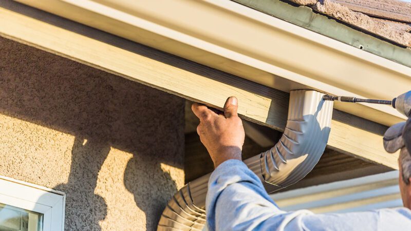 Seamless Integration: Installing Gutters and Downspouts with Metal ...